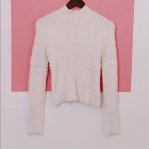 Fuzzy white sweater